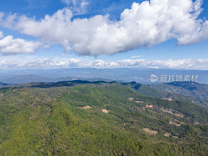 航拍蓝天白云下的景迈山山脉自然风光