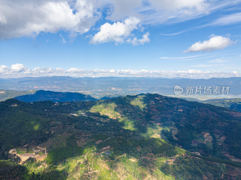 航拍蓝天白云下的景迈山山脉自然风光