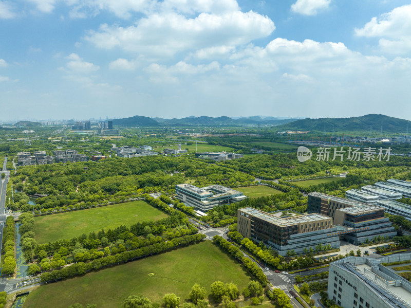 航拍夏季蓝天白云天空下苏州科技城城市风光