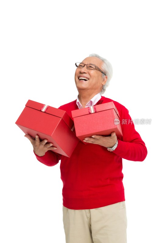 棚拍老年男人拿着礼盒