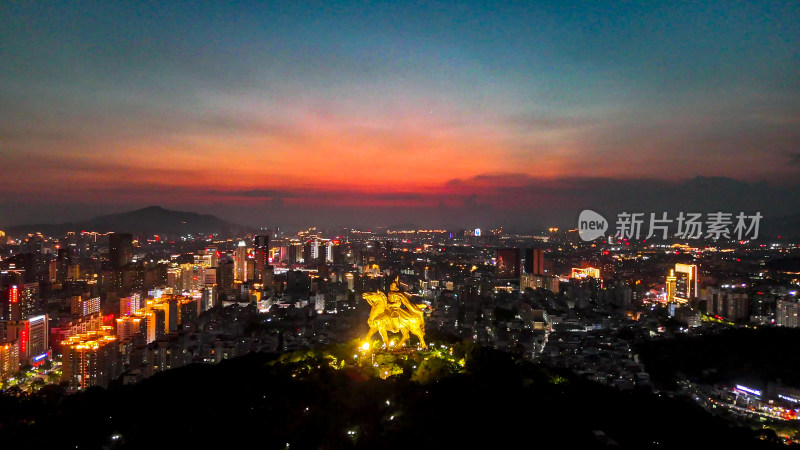 夕阳晚霞中的泉州夜景航拍图