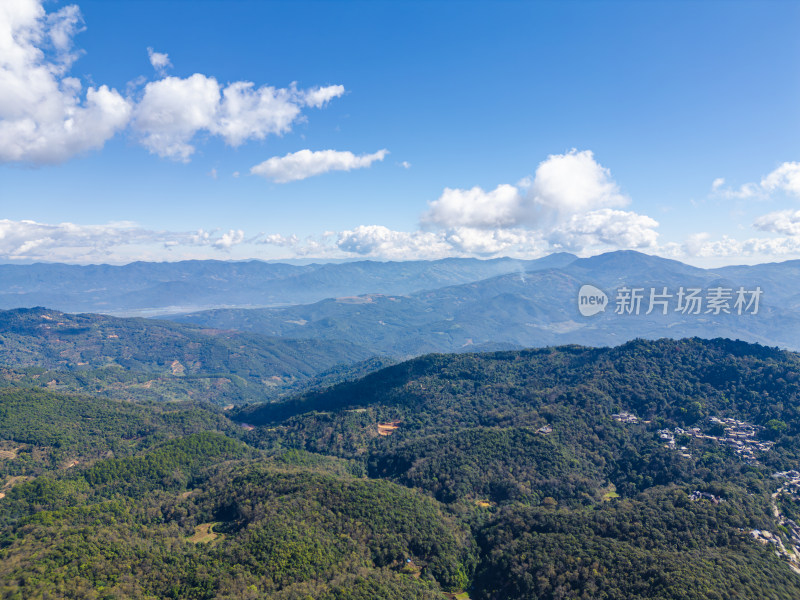 航拍蓝天白云下的景迈山山脉自然风光