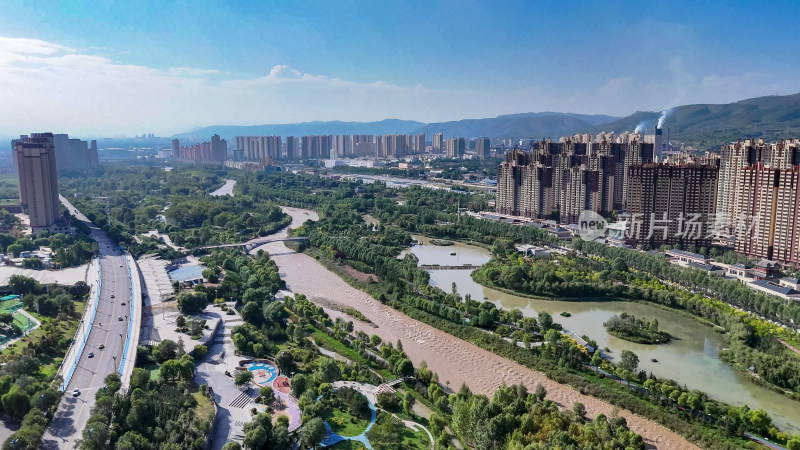 青海西宁湟水绿化植物城市风光航拍图