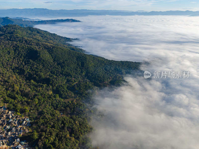 航拍景迈山云海环绕的古寨村庄自然风光