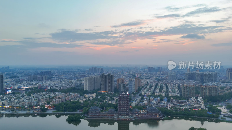 航拍眉山日落晚霞眉山远景楼摄影图