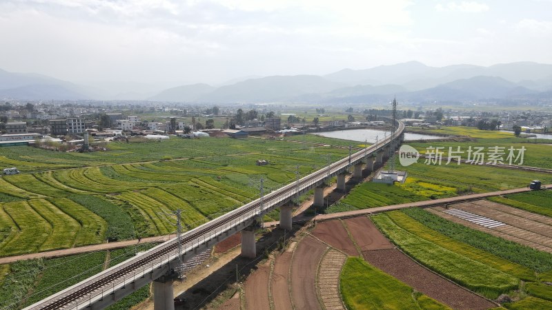 航拍高铁乡村铁路桥与田园风光