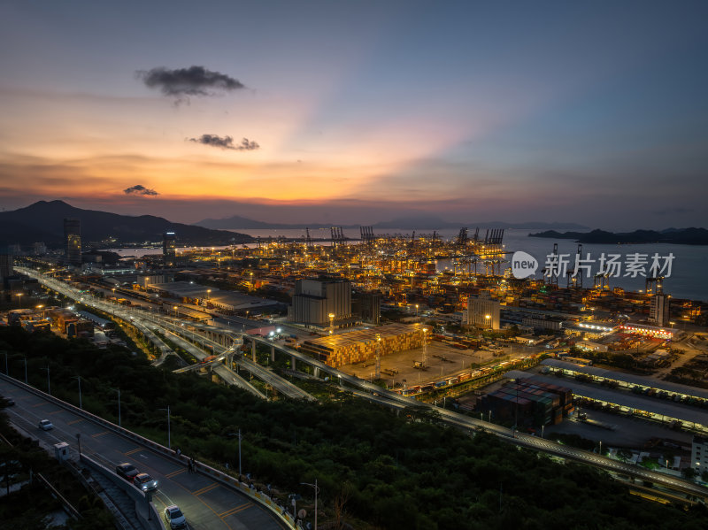 深圳盐田港繁忙港口货物集装箱夜景蓝调航拍