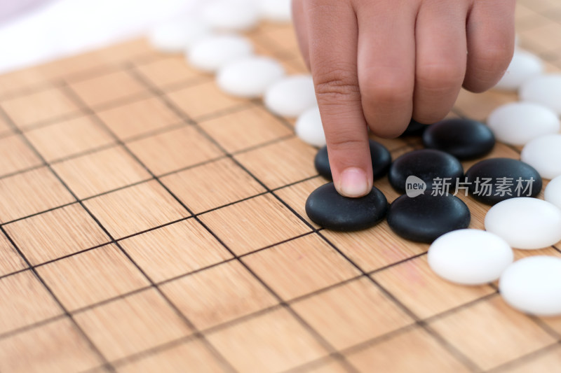 中国围棋和中国孩子的手