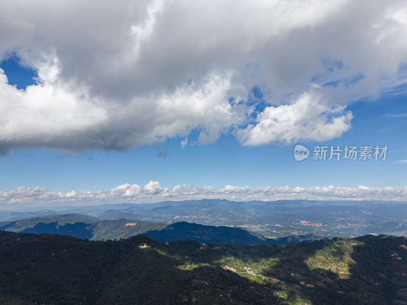 航拍蓝天白云下的景迈山山脉自然风光