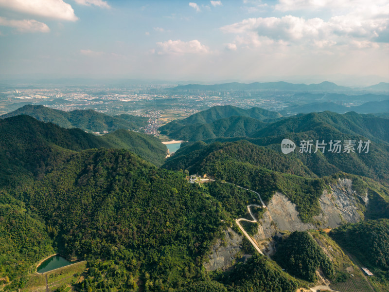 航拍蓝天白云下的青山河流稻田乡村风光