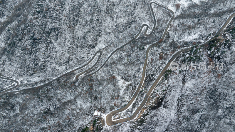 冬天雪后大山公路交通航拍