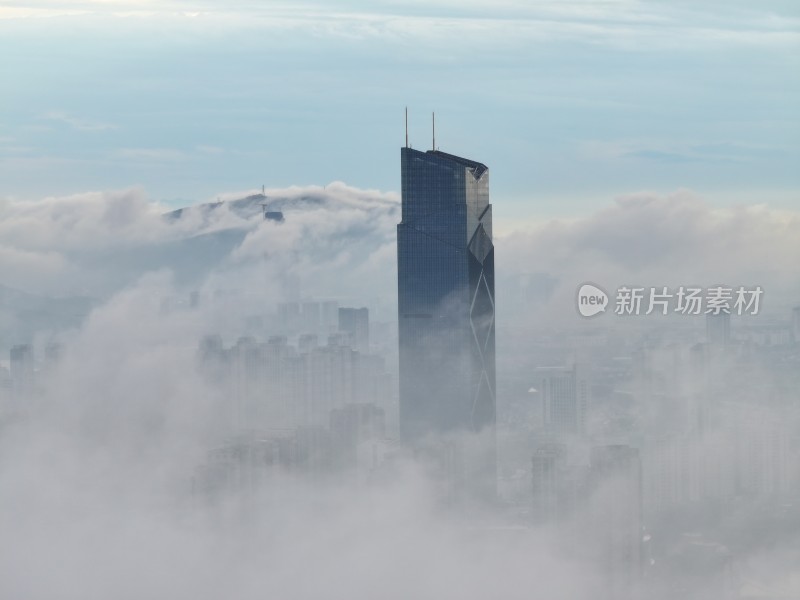 浙江湖州地标云雾缭绕的城市高空鸟瞰全景