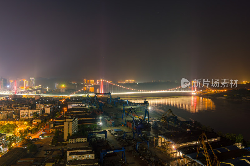 夜色下的城市跨江大桥及沿岸风光全景