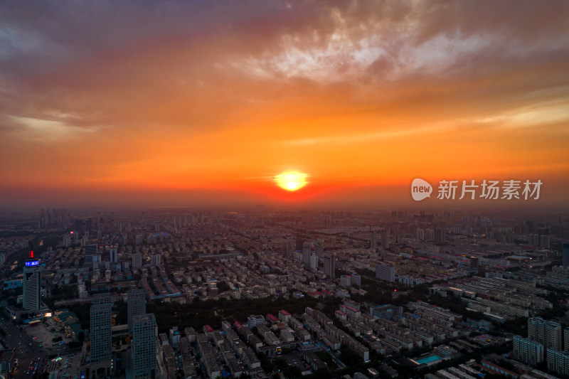 城市日落晚霞夕阳航拍摄影图山东济宁