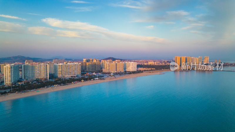 航拍视角烟台海岸线高楼大厦