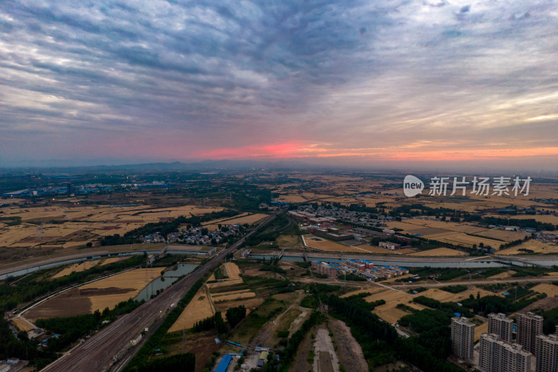 河南平原晚霞夕阳城市航拍图