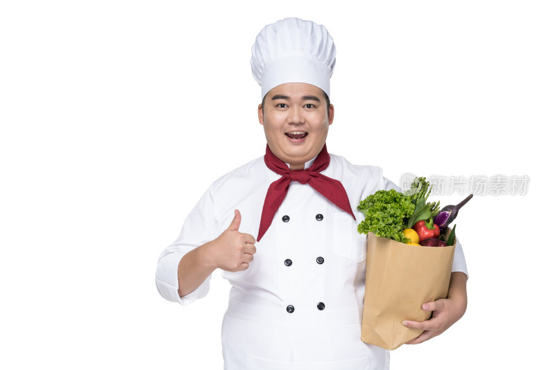 肥胖的厨师抱着一包蔬菜