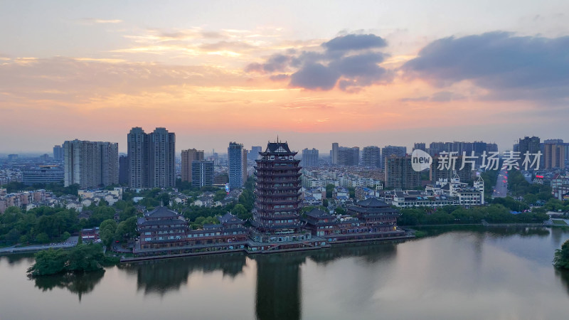 航拍眉山日落晚霞眉山远景楼摄影图