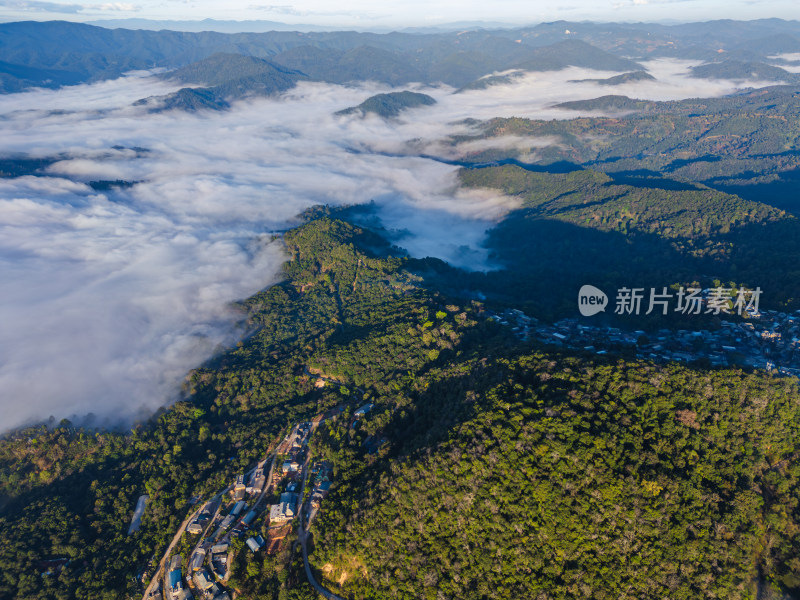 航拍景迈山云海环绕的古寨村庄自然风光