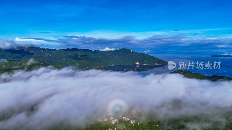 海上岛屿云海佛光美景航拍图