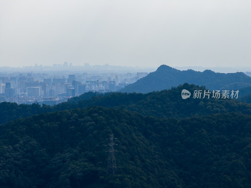 航拍杭州西湖群山和远处的建筑