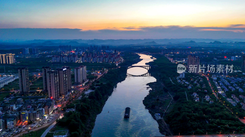 广西来宾城市夜幕降临夜景航拍图