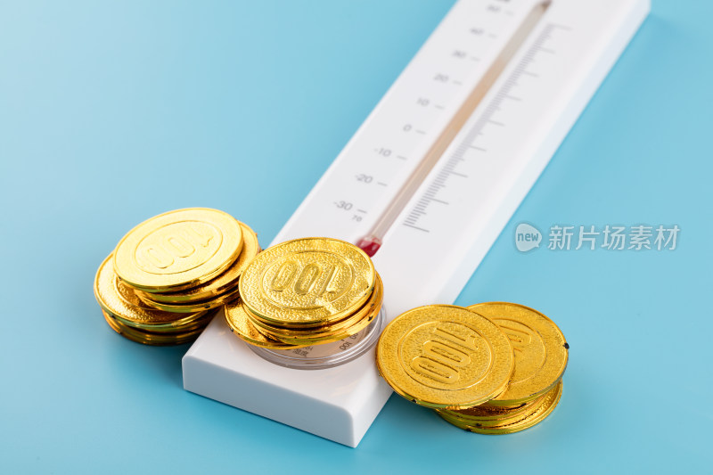 温度表上的金币资金金融概念