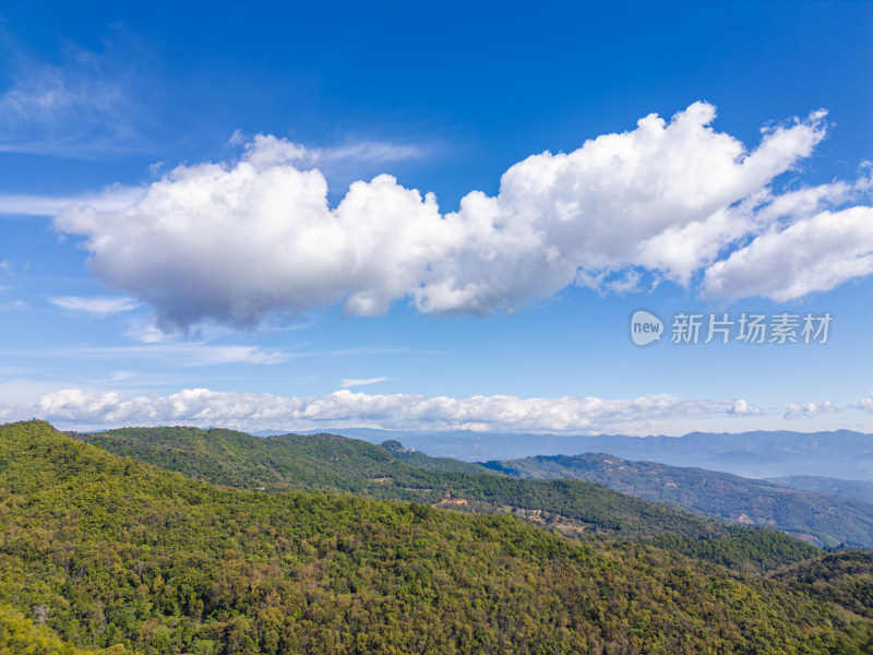 航拍蓝天白云下的景迈山山脉自然风光