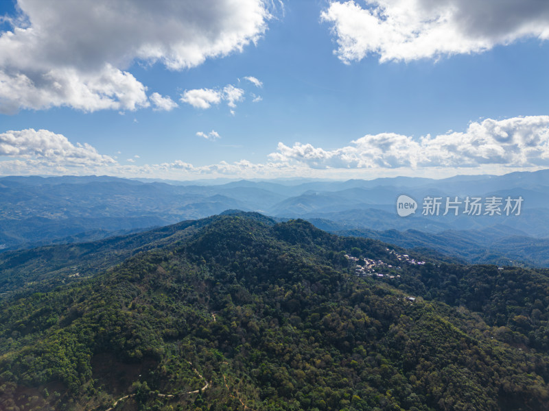 航拍蓝天白云下的景迈山山脉自然风光