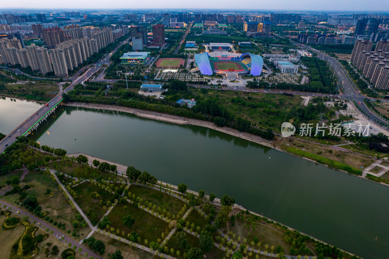 河南周口城市晚霞夜幕降临航拍图