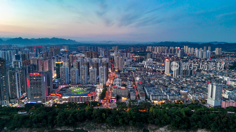 广西来宾城市夜幕降临夜景航拍图