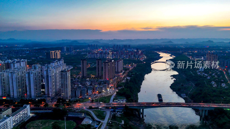 广西来宾城市晚霞夕阳航拍图