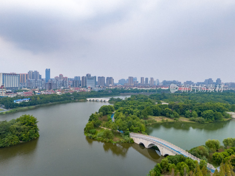 眉山远景楼河流周边风景航拍图