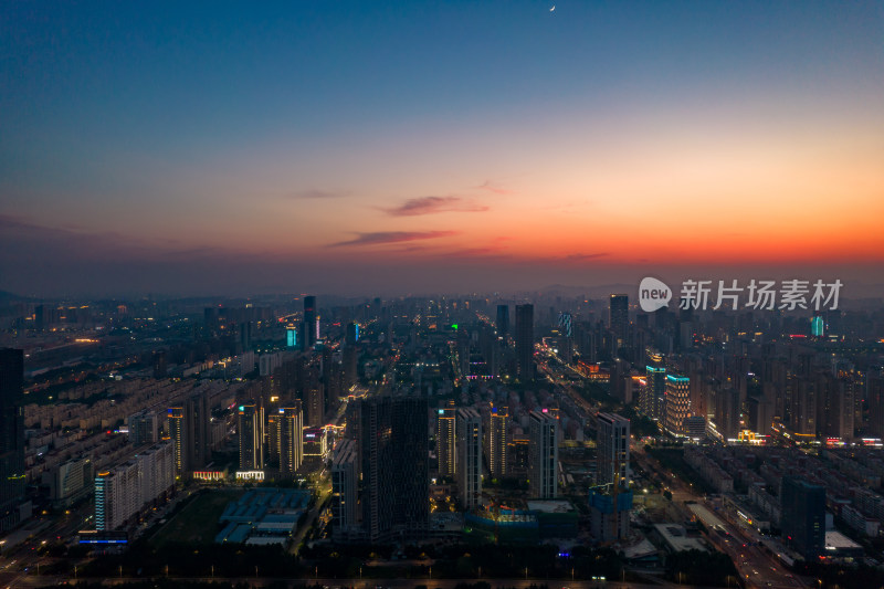 山东日照城市夜幕降临夜景灯光晚霞航拍