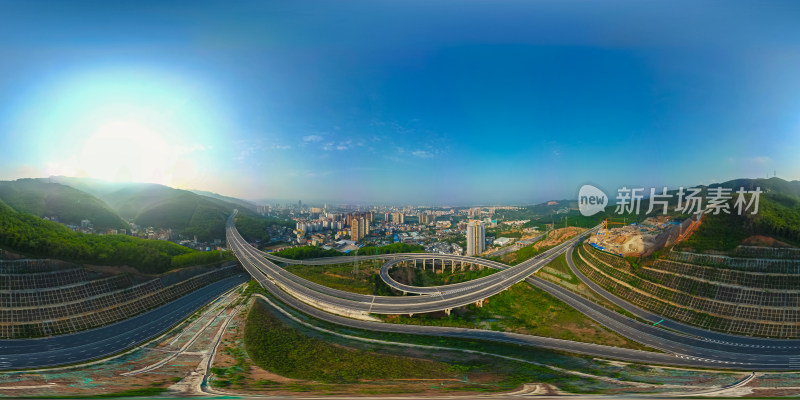 航拍景洪市城市天际线与高架桥交通全景图