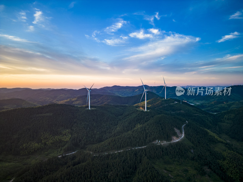 夕阳晚霞山川风车发电航拍摄影图