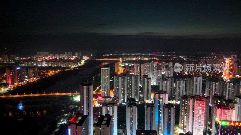 广西来宾城市高楼建筑夜景灯光航拍图