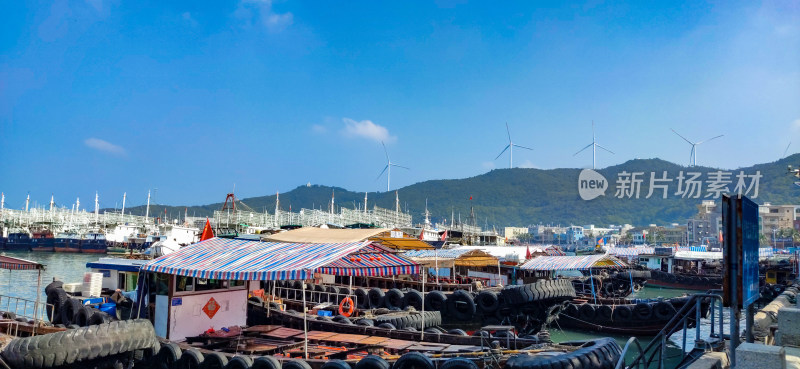 广东阳江海陵岛渔船渔村摄影图