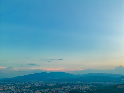 航拍西双版纳景洪市夕阳时分城市风光