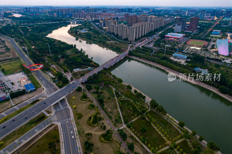 河南周口城市晚霞夜幕降临航拍图