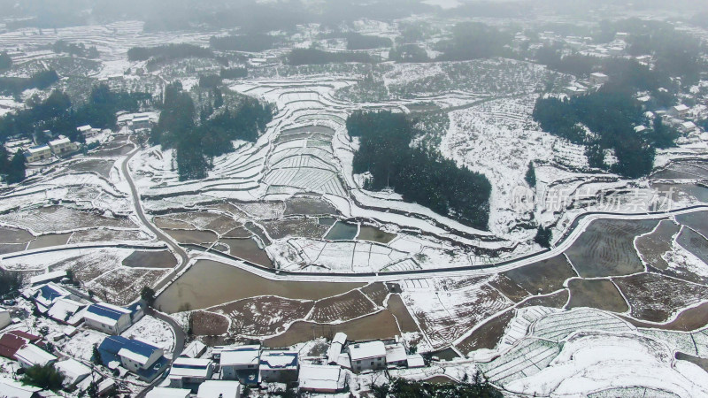 航拍冬天山区农田雪景