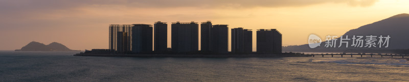 海南万宁日月湾海滨城市高楼日落景观