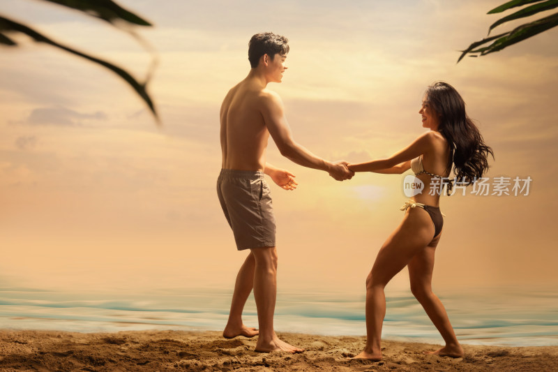 青年情侣在沙滩上手牵手