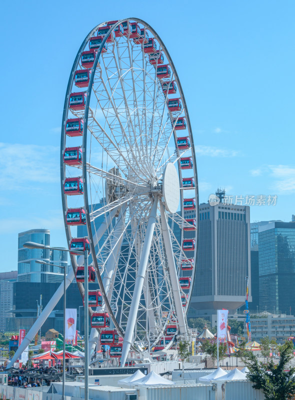 香港中环海滨长廊游乐园摩天轮与城市建筑