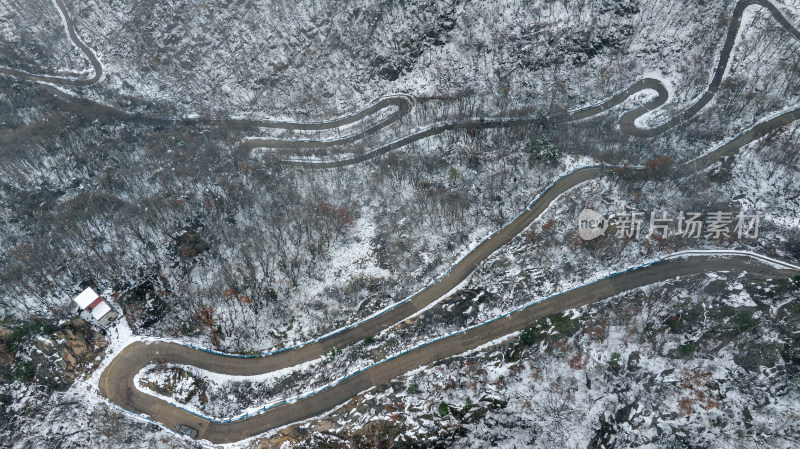 冬天雪后大山公路交通航拍