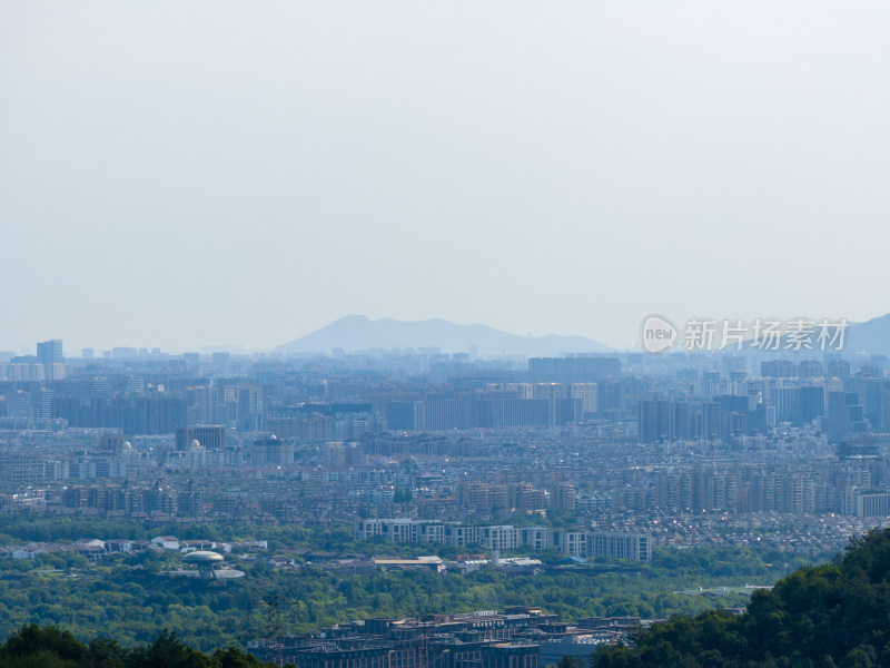 航拍杭州西湖群山和远处的建筑