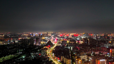 夕阳晚霞中的泉州夜景航拍图