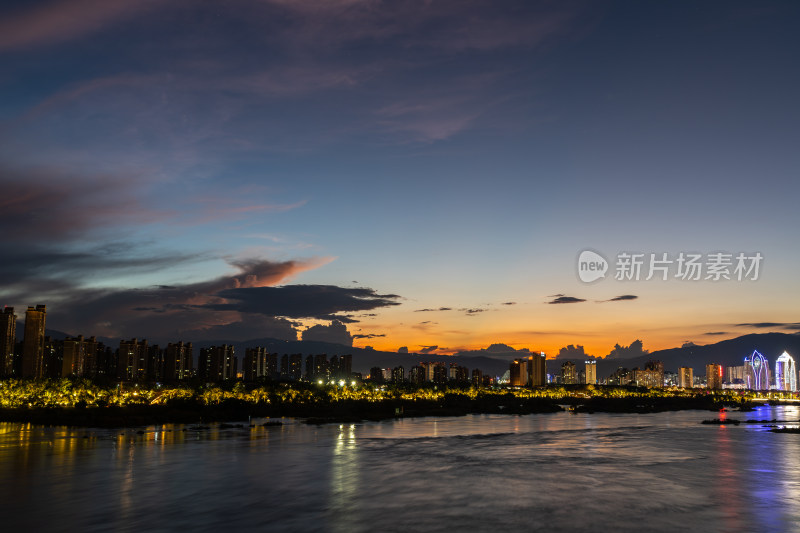 西双版纳城市夜景与流云晚霞