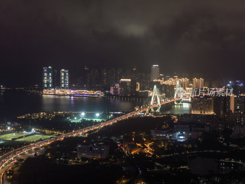 海南海口海滨新城城市车水马龙夜景灯光航拍