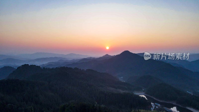 航拍连绵起伏山川日落晚霞